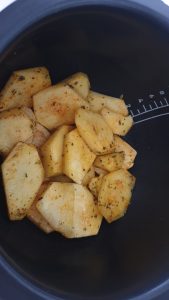 Patatas doradas en el robot
